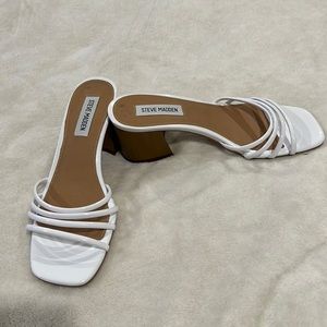 Never worn!  Needed a half size larger.